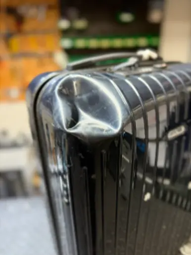 RIMOWA ボディ凹み補正修理（塗装なし）